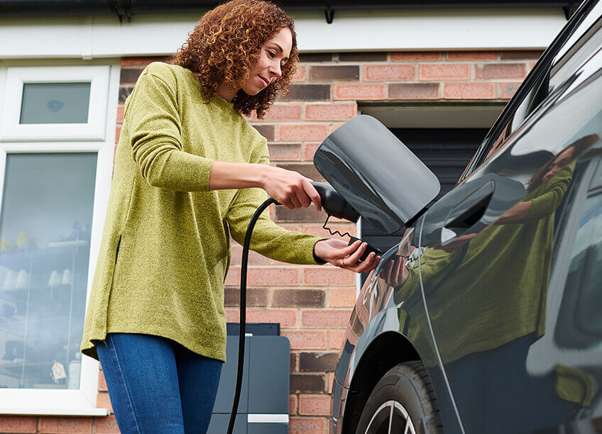 A residential electric vehicle (EV) charging station installation in a home, showcasing the connection between home energy solutions and electrical work. This image highlights the increasing need for sustainable home systems, including HVAC services, furnace repair, air quality testing, and installation of energy-efficient systems like an EV charger. It also connects to broader home improvement services such as boiler repair, ductwork, furnace replacement, and electrical contractor services. Ideal for homeowners seeking green energy options and reliable electrical services.