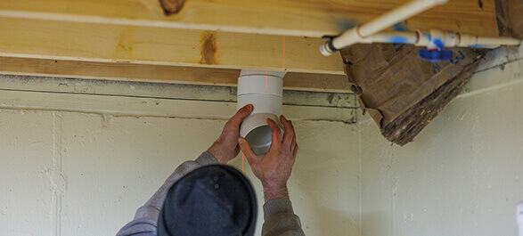 A technician is performing HVAC ductwork installation by connecting a section of the duct for an aeroseal duct sealing service. Aeroseal duct sealing helps to improve the efficiency of heating and cooling systems by eliminating air leaks, ensuring proper airflow, and reducing energy costs. The professional is using advanced tools to secure the ventilation system, which is crucial for effective furnace repair and overall home comfort. This procedure plays a vital role in maintaining high indoor air quality and efficient HVAC system performance.