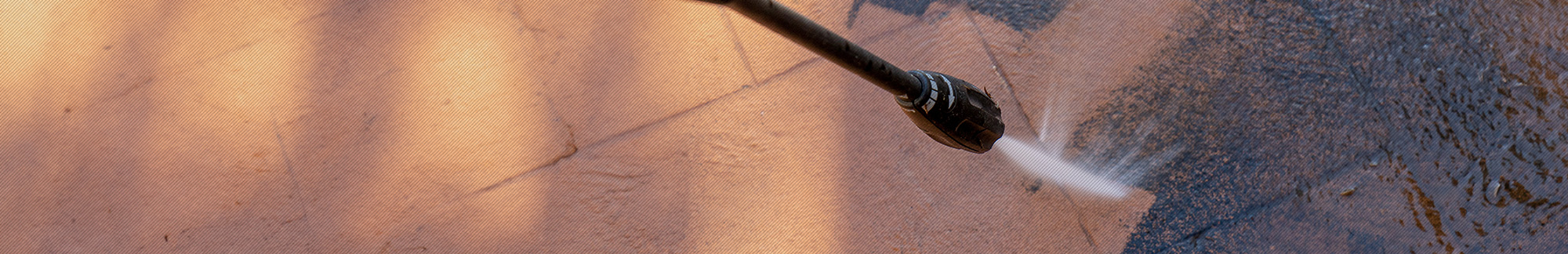 A pressure washer in action, demonstrating the power and effectiveness of cleaning tools in home maintenance. This image complements handyman services that involve high-pressure cleaning, along with HVAC installation, furnace replacement, and air duct cleaning. The pressure washing process is essential for maintaining a clean and safe home exterior, just as HVAC services ensure a well-maintained and efficient heating, ventilation, and air conditioning system for optimal indoor comfort.